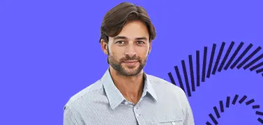 A young man in an office attire on a blue background.