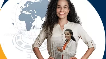 Person smiling with curly hair, globe in background