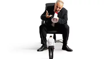 Large person with megaphone shouting at smaller person.