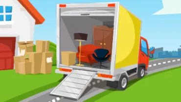 A moving truck with furniture and boxes near a house.
