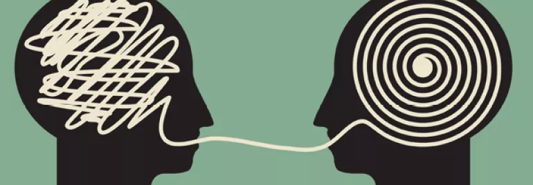 Illustration of two heads, with a line connecting a complex scribble to an orderly spiral.