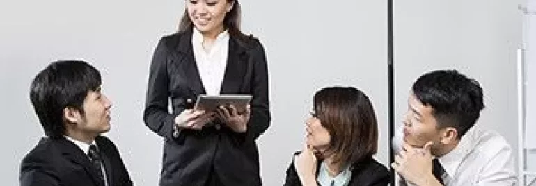 People in a business meeting discussing ideas.